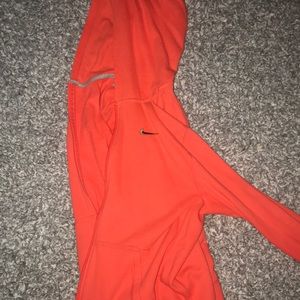 bright orange Nike zip up!